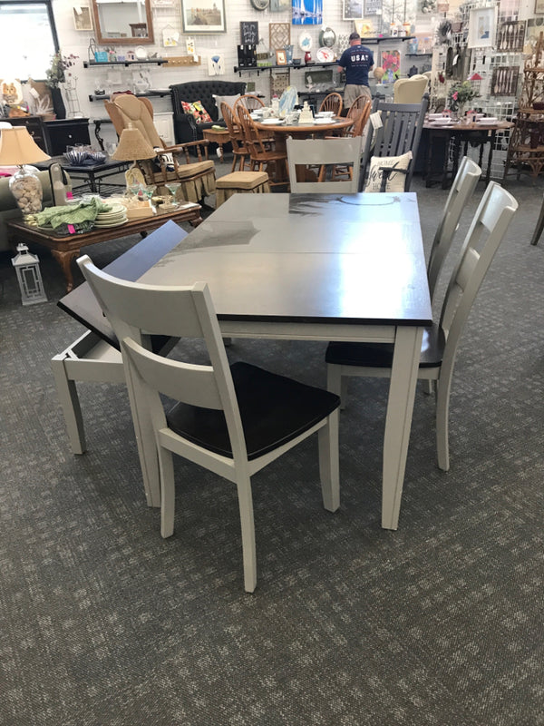 BLACK TOP TABLE AND GREY LEGS W/ 4 CHAIRS, BENCH AND LEAF.