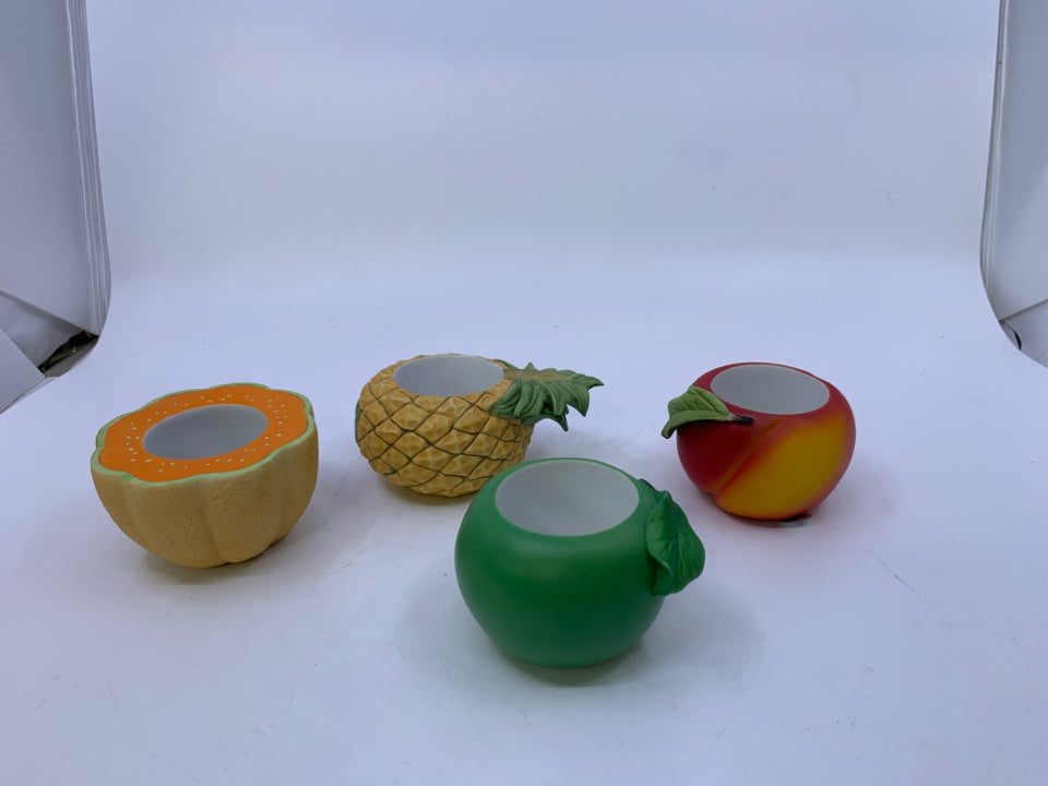 4 ASSORTED CERAMIC FRUIT TEA LIGHT HOLDERS.