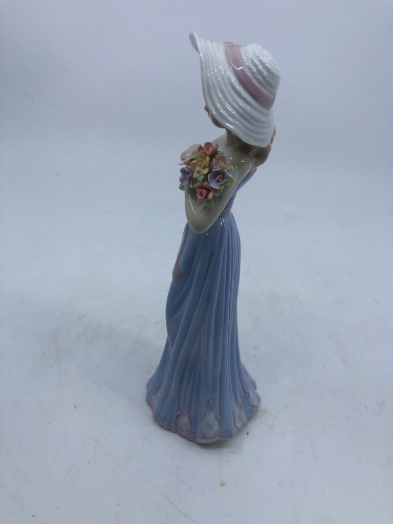 GIRL IN BLUE DRESS W FLORAL- GATHERING FLOWERS.