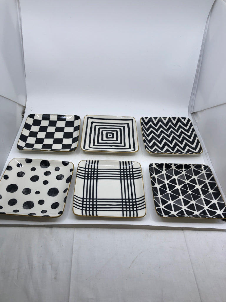 6 SQUARE ASSORTED B/W PATTERN APPETIZER PLATES W/ DARK YELLOW EDGE.