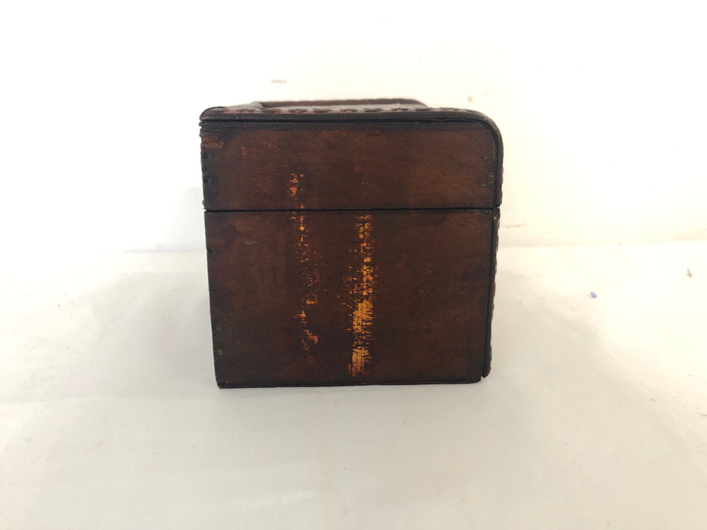 TRIPLE EMBOSSED STORAGE CUBES IN SHELF.