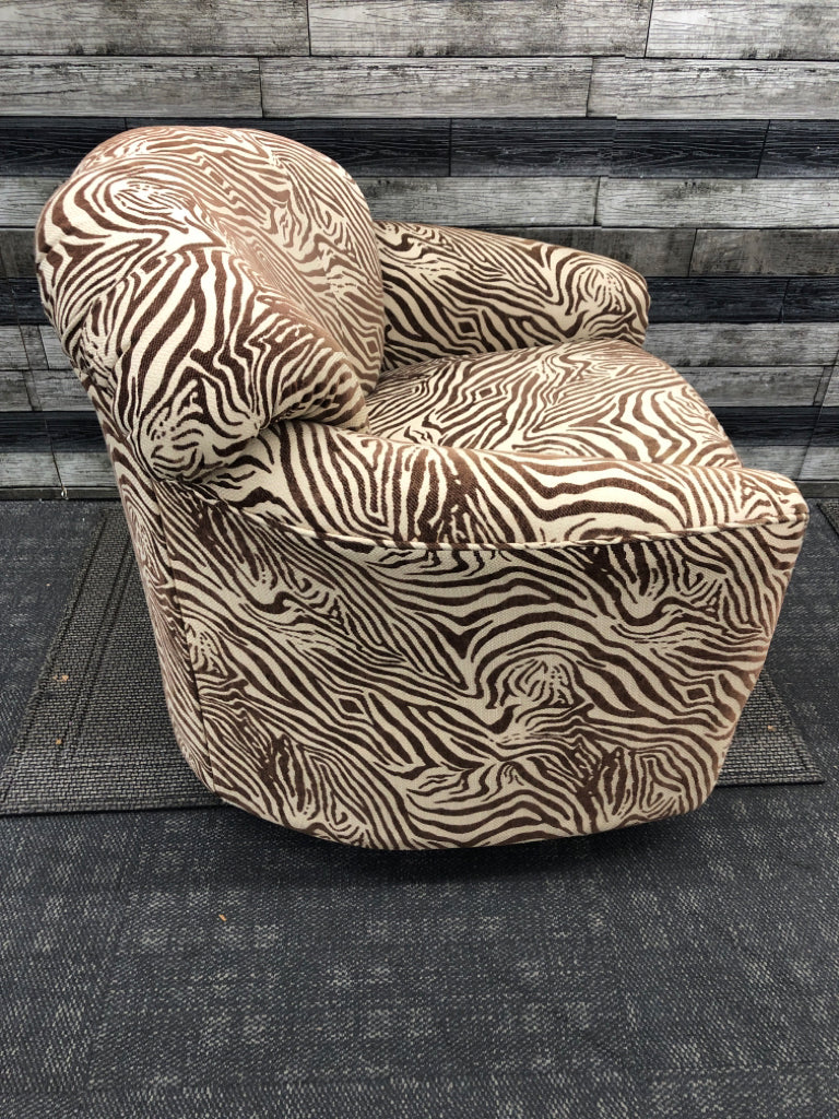 BROWN ZEBRA SWIVEL CHAIR.