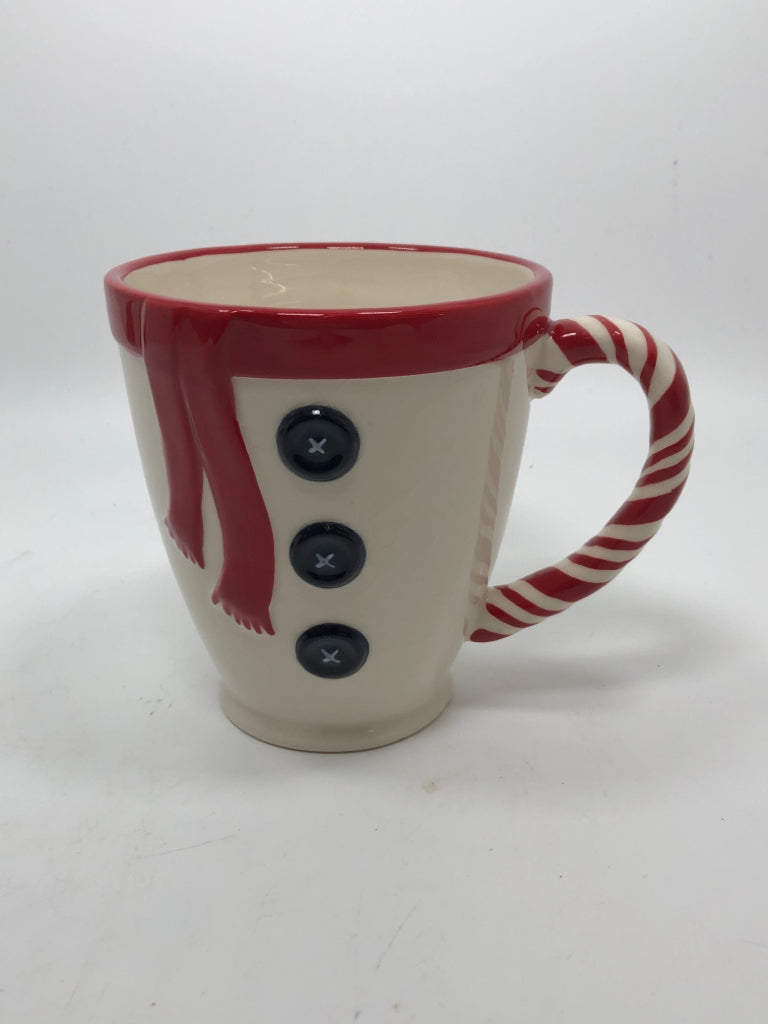 WHITE MUG RED SCARF BLACK BUTTONS.