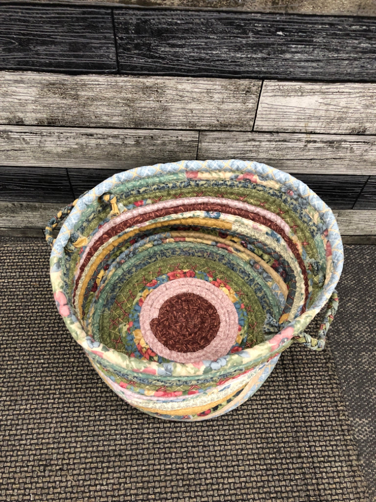 QUILTED STRIPED FABRIC BASKET.