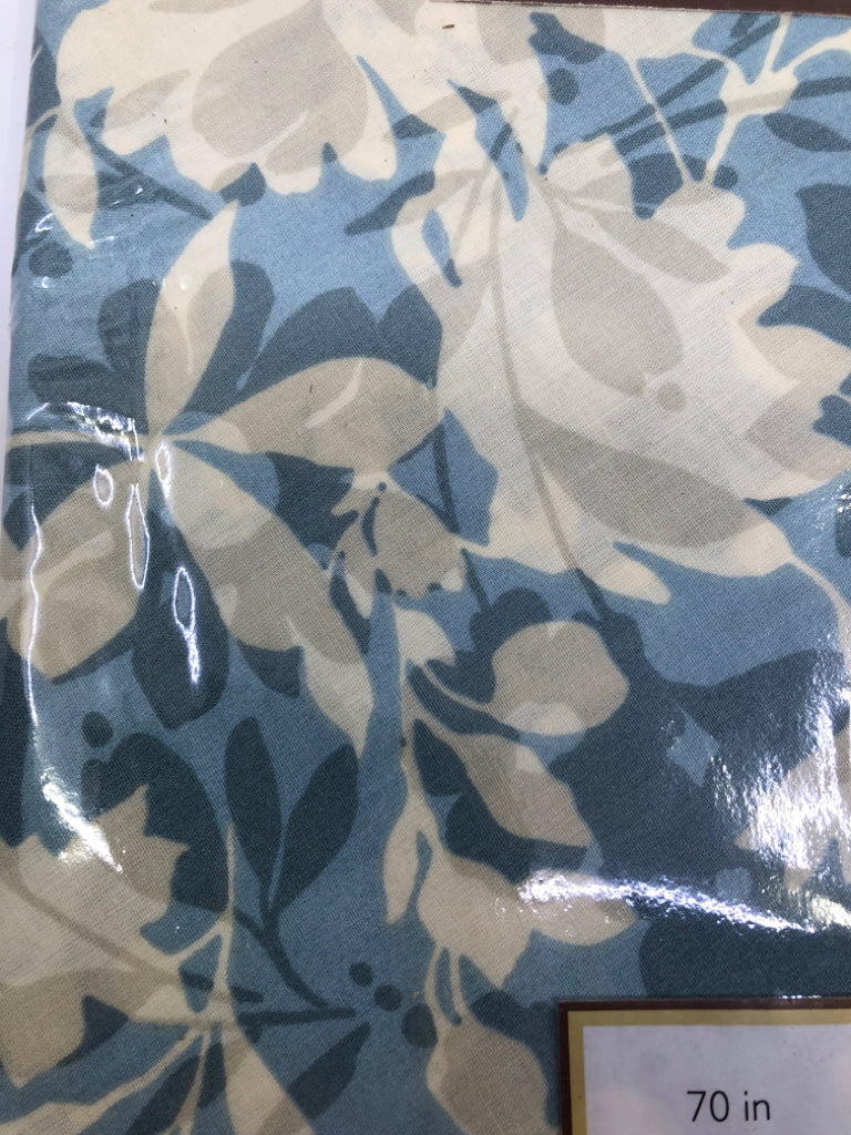 NIP LAMINATED FABRIC TABLECLOTH W/ BLUE/WHITE FLORAL PATTERN.