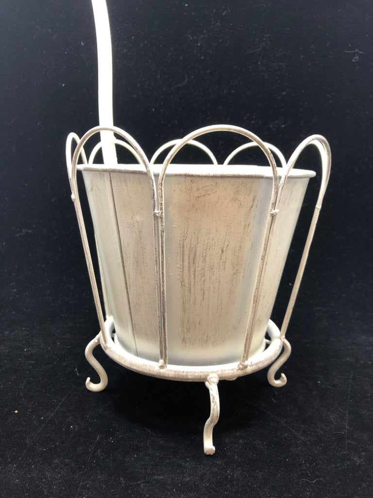 DISTRESSED METAL FAUCET PLANTER.