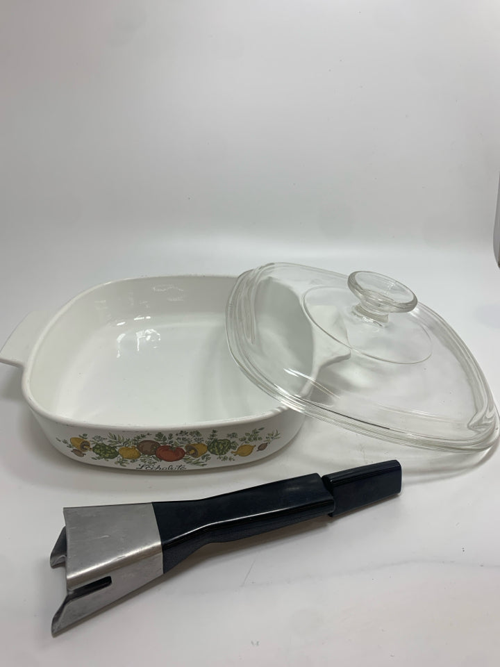 SPICE OF LIFE CASSEROLE DISH W/LID AND LOCKING HANDLE.