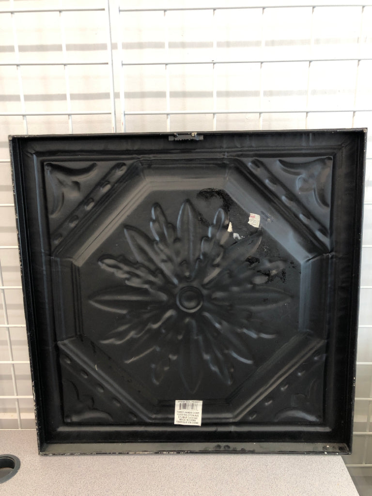 DISTRESSED METAL MEDALLION WALL HANGING.