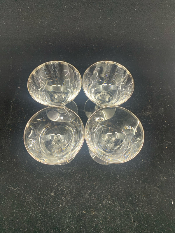 4 SMALL GLASSES W/ SILVER RIM.