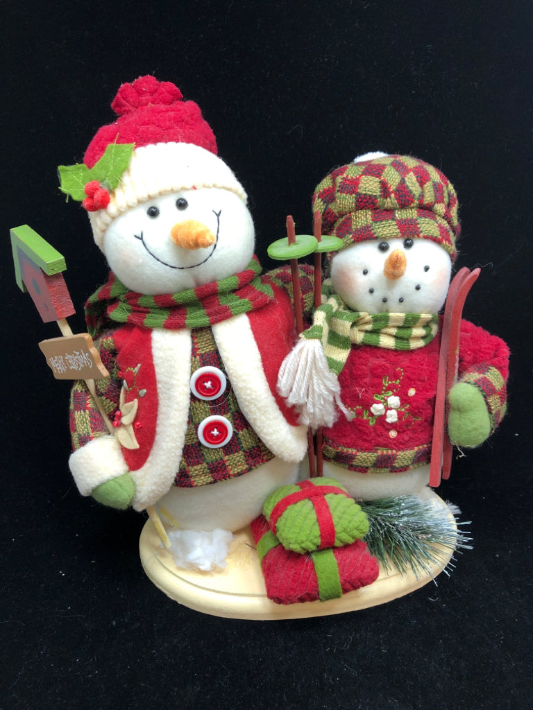 3 PLUSH SNOWMEN HOLDING SKIS.