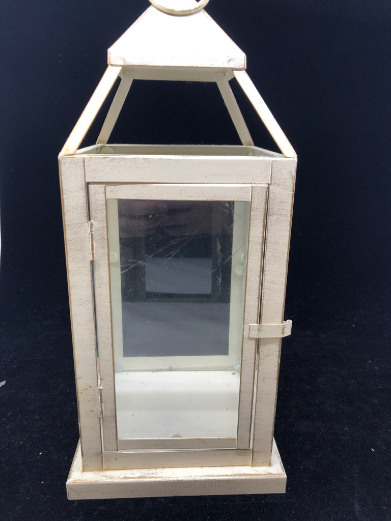 CREAM DISTRESSED LANTERN W/ GLASS PANES.