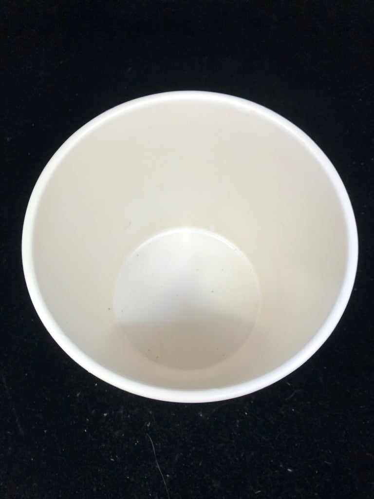 WHITE CERAMIC PLANTER.