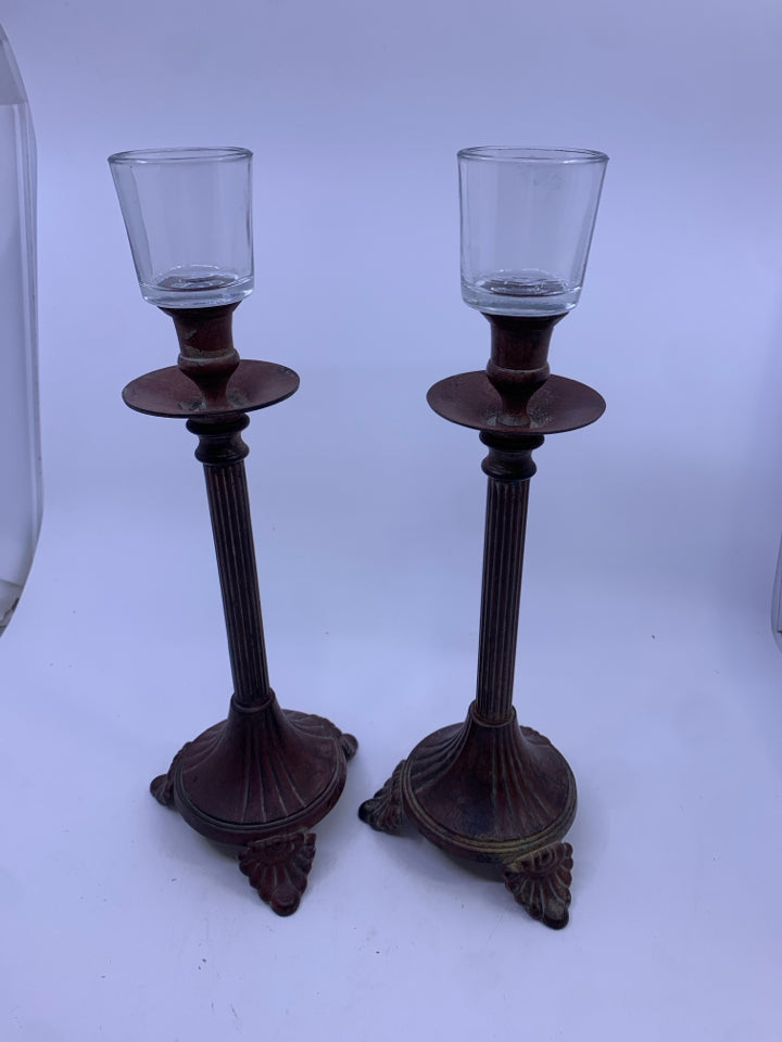 2 TALL METAL VOTIVE HOLDER.