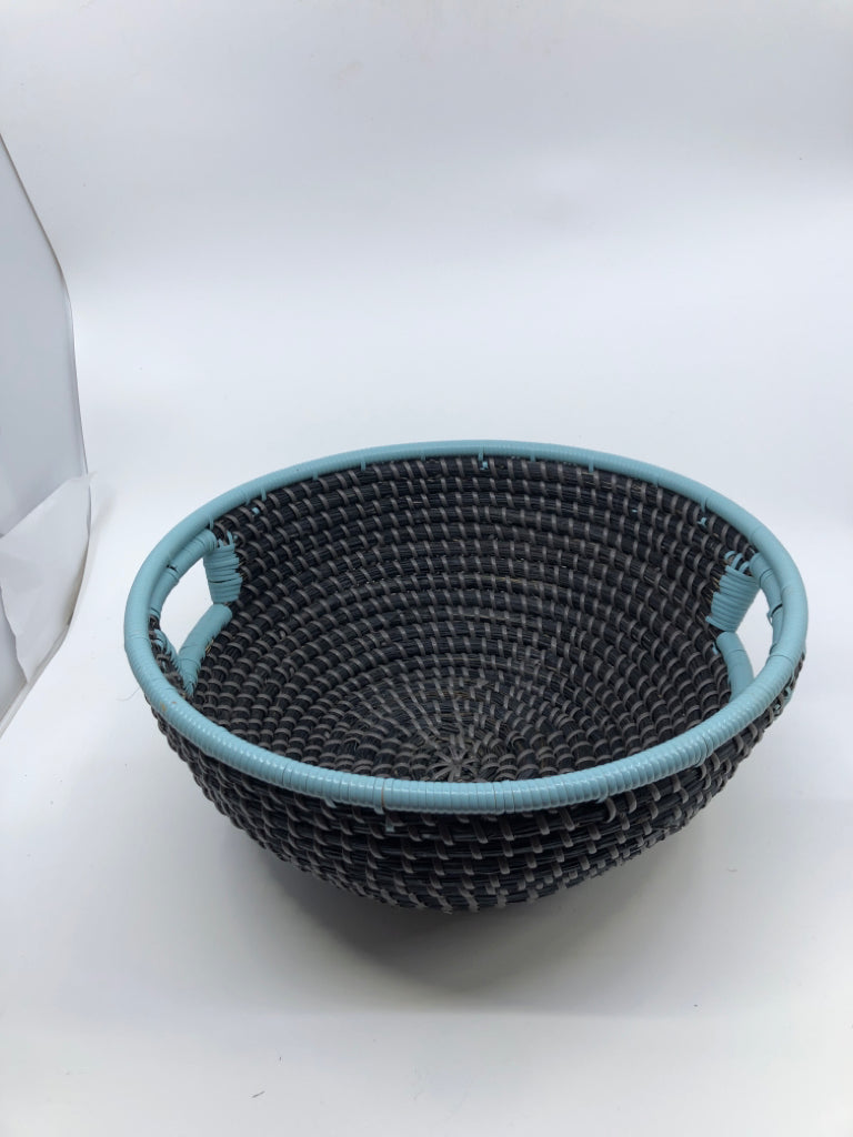 BLACK WOVEN BASKET W/ TEAL RIM/HANDLES.