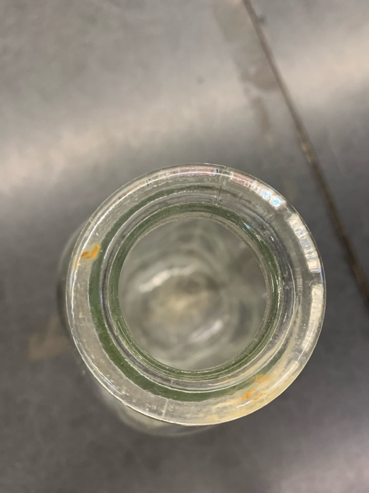 CLEAR MILK EMPTY BOTTLE.