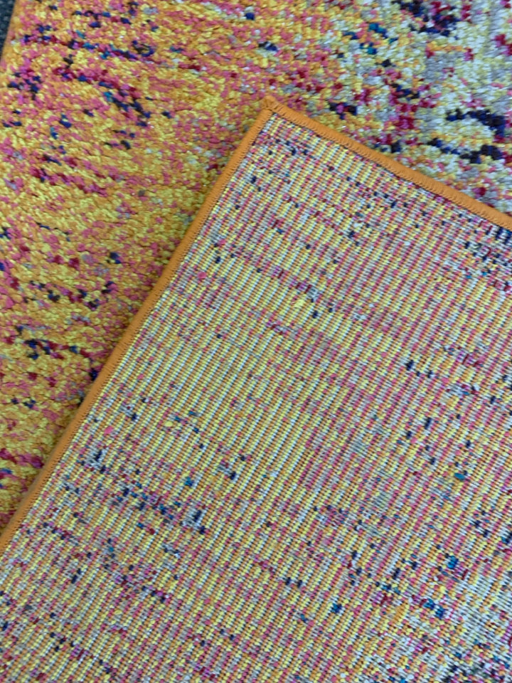 ORANGE MULTI COLORED RUG RUNNER.