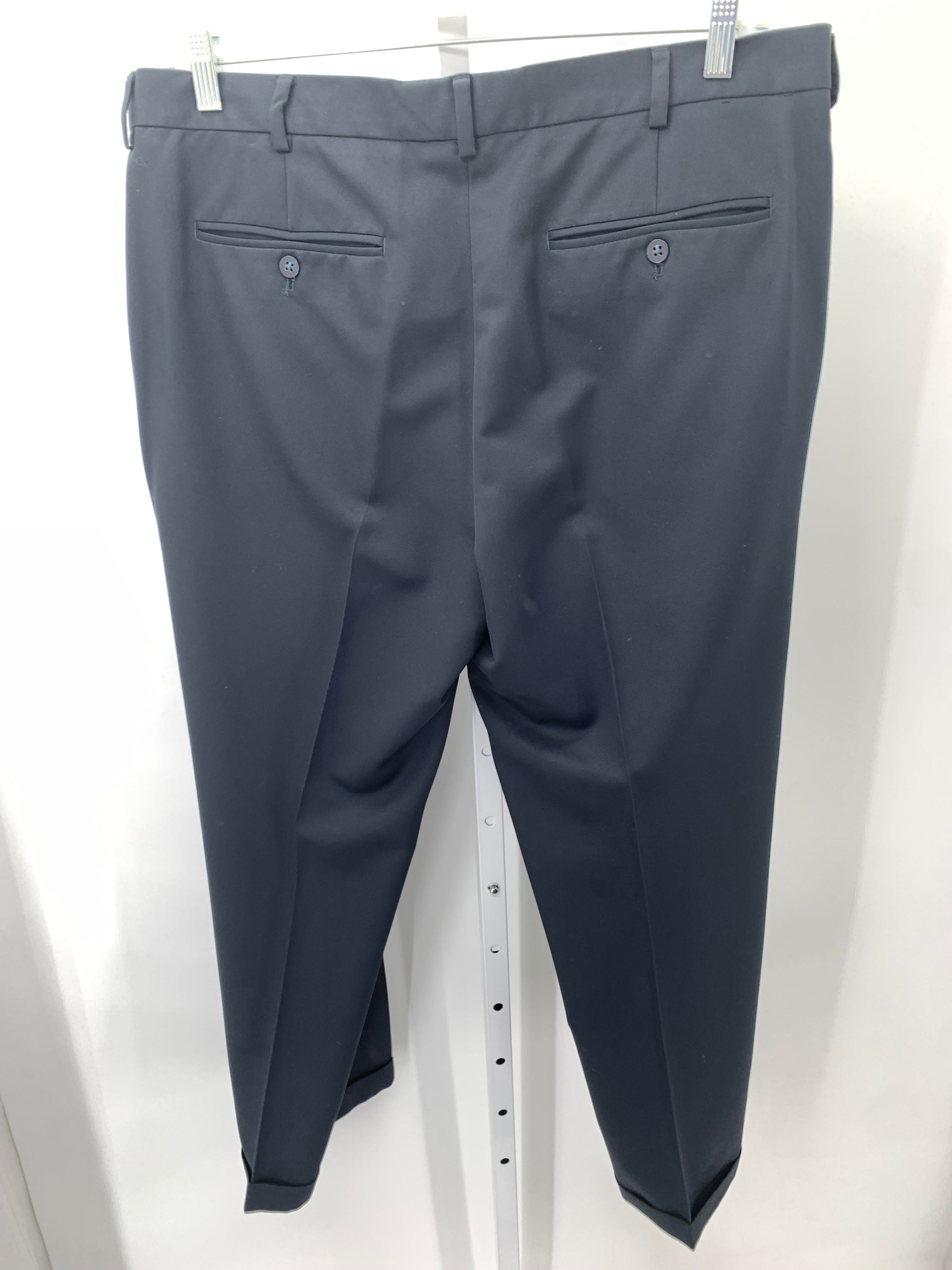 PLEATED FRONT PANTS