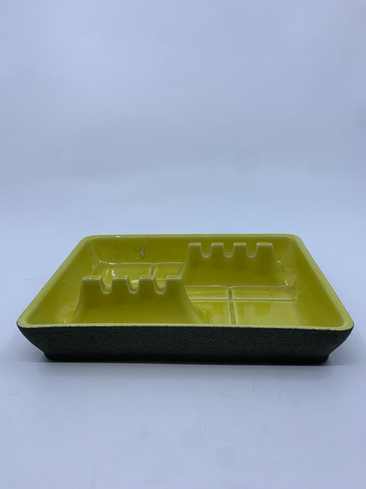 VTG ASHTRAY YELLOW INSIDE TEXTURED RIM CORK BOTTOM.