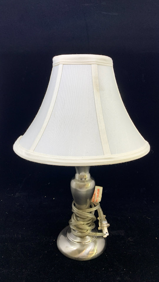 SILVER BASE TABLE LAMP W/WHITE SHADE.