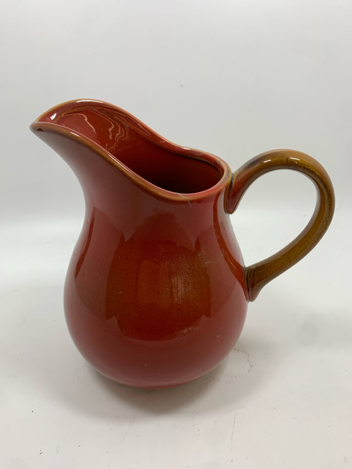 RED CERAMIC PITCHER.