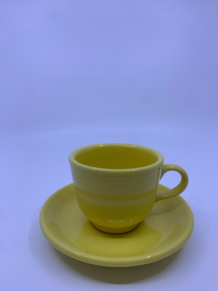 YELLOW FIESTA WARE CUP AND SAUCER.