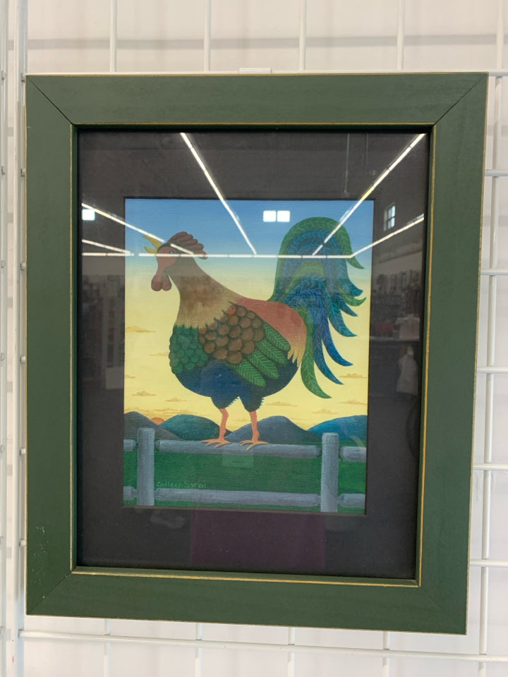 ROOSTER PRINT IN GREEN FRAME.