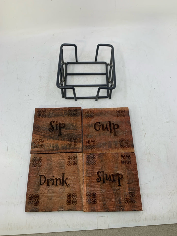 4 CARVED WOOD COASTERS IN STAND