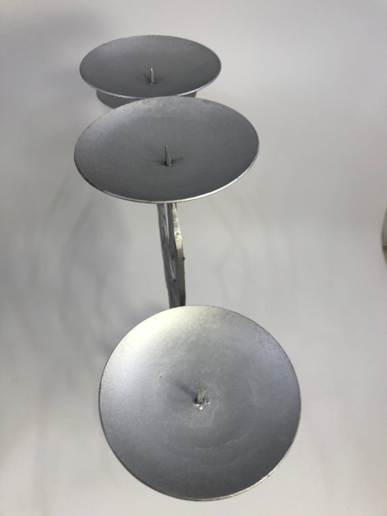 SILVER PAINTED METAL 4 SECTION CANDLE HOLDER.