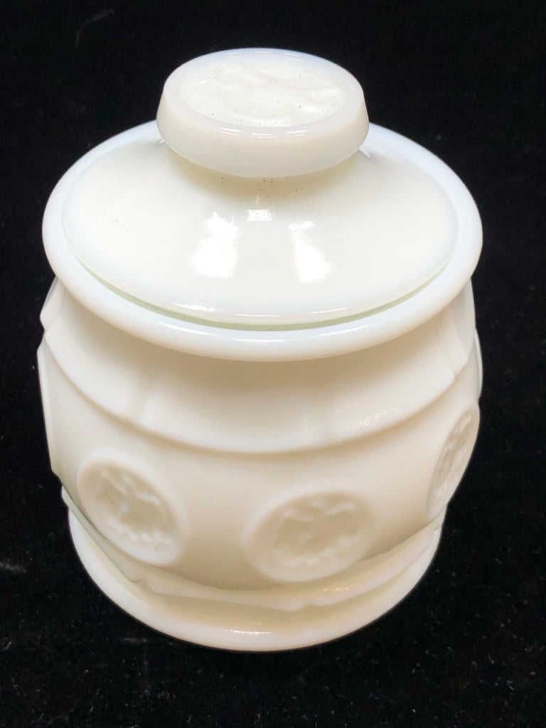 VTG MILK GLASS COVERED JAR W/EAGLE MEDALLION.
