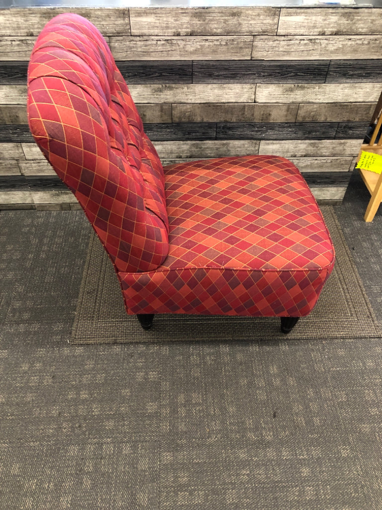 MULTI COLORED PRISM PATTERN FABRIC ACCENT CHAIR.