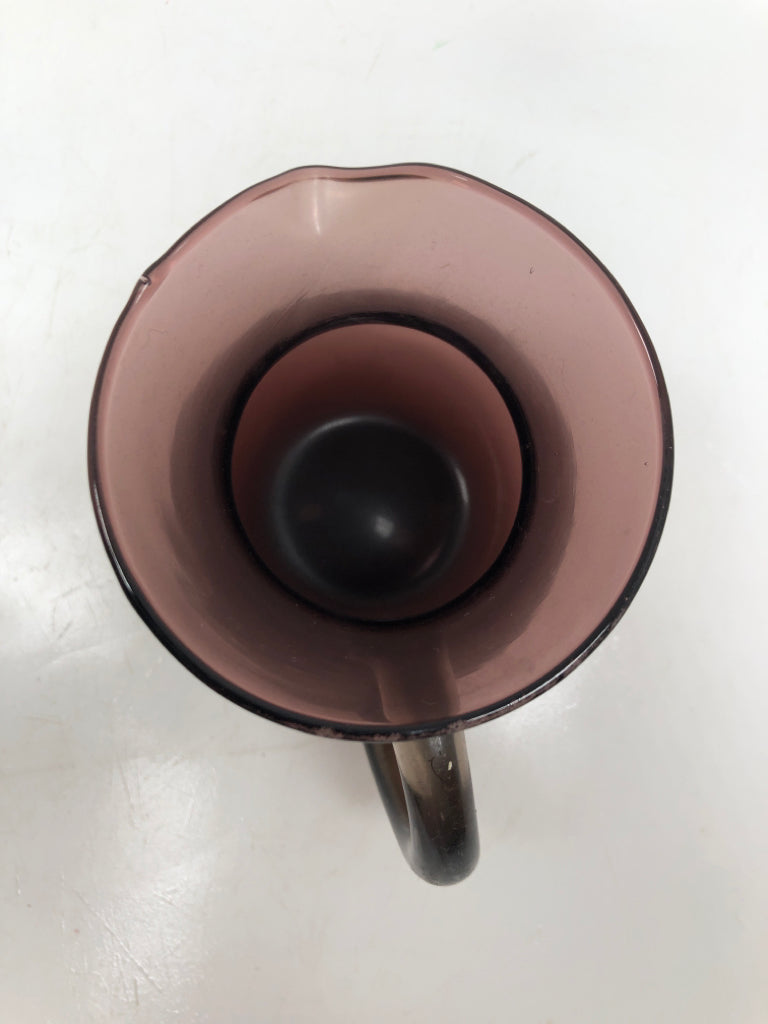 SMALL PURPLE GLASS PITCHER.