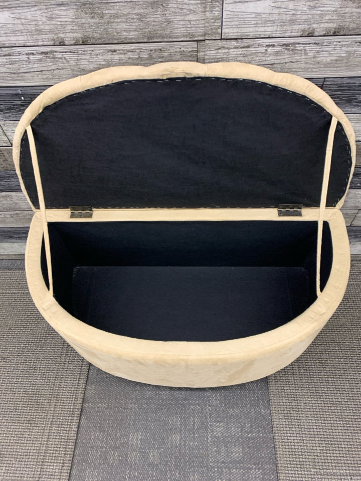 TAN HALF-MOON VELVET STORAGE OTTOMAN.
