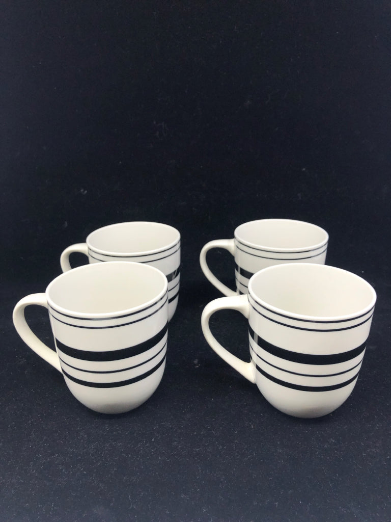 4 WHITE MUGS W/ BLACK STRIPES.