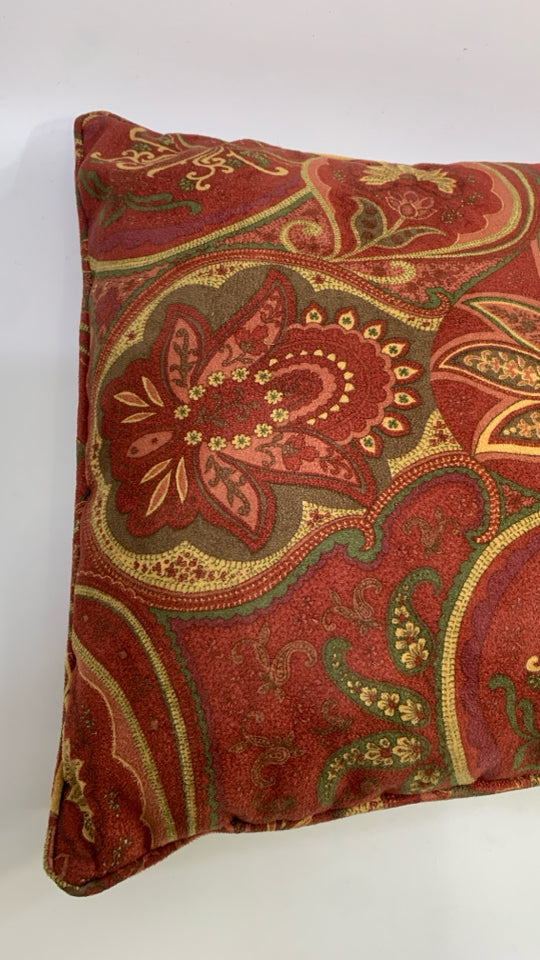 RED RECTANGLE ACCENT PILLOW W/FLORAL DESIGN.