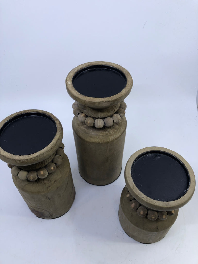 3 WOOD PILLAR CANDLE HOLDERS W/ BEADED NECK.