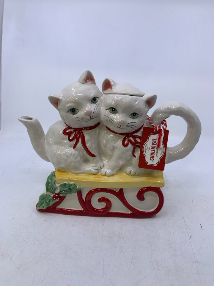 WHITE KITTENS ON SLED TEA POT.