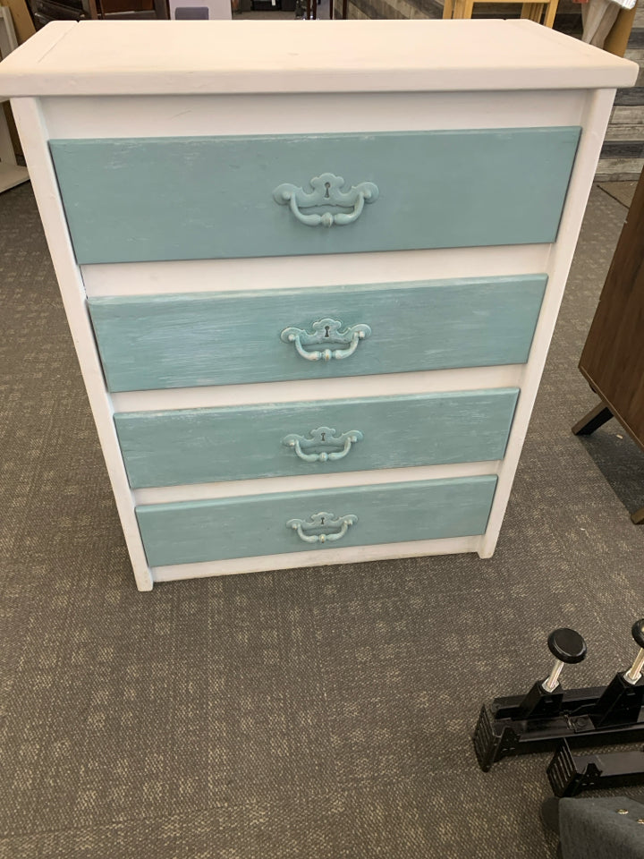 WHITE SHORT DRESSER W 4 TEAL DRAWERS.