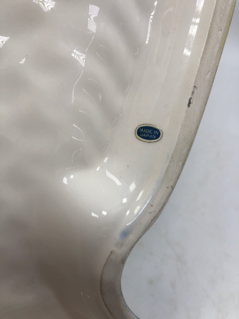 WHITE CERAMIC FISH MOLD W/BLUE RIM.