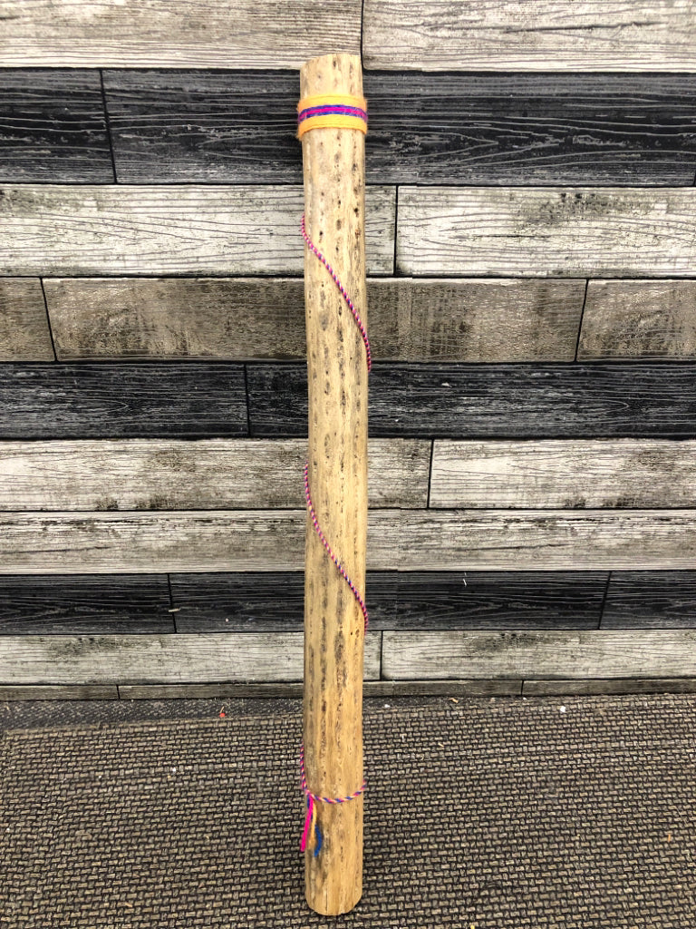 YARN WRAPPED RAIN STICK.