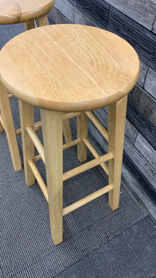 2 BLONDE WOOD STOOLS.