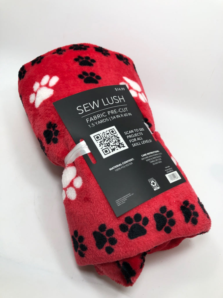 NWT RED PAWPRINT PRE-CUT FABRIC.