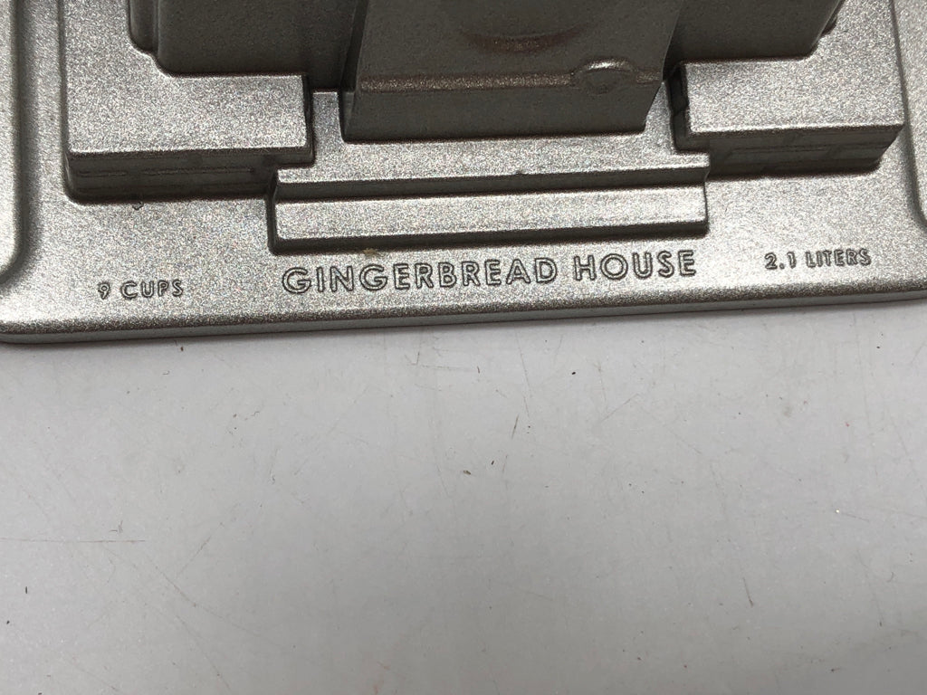 NORDIC WARE GINGERBREAD CAST ALUMINUM PAN.