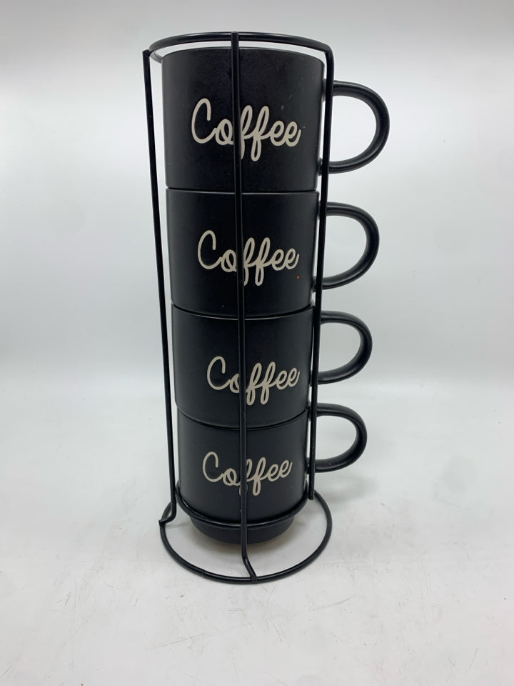 4 BLACK COFFEE MUGS IN STAND.