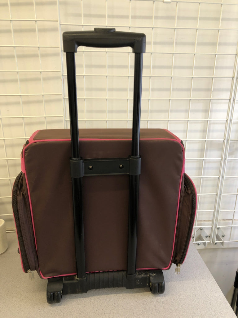 PINK AND BROWN ROLLING SCRAPBOOK CASE.