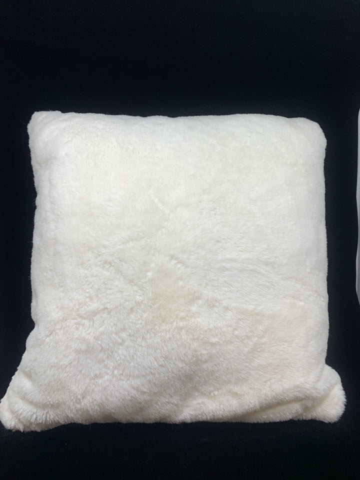FLUFFY WHITE PILLOW.