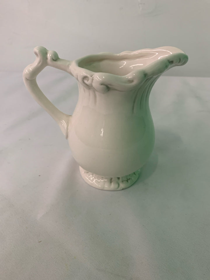 SMALL WHITE PITCHER.