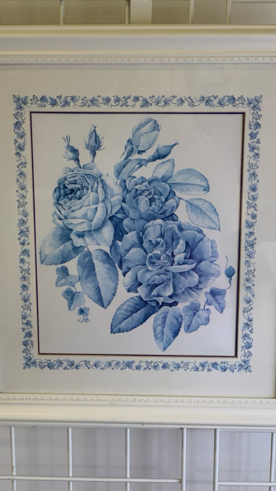 BLUE FLOWERS IN WHITE BACKGROUND IN WHITE FRAME WALL ART.