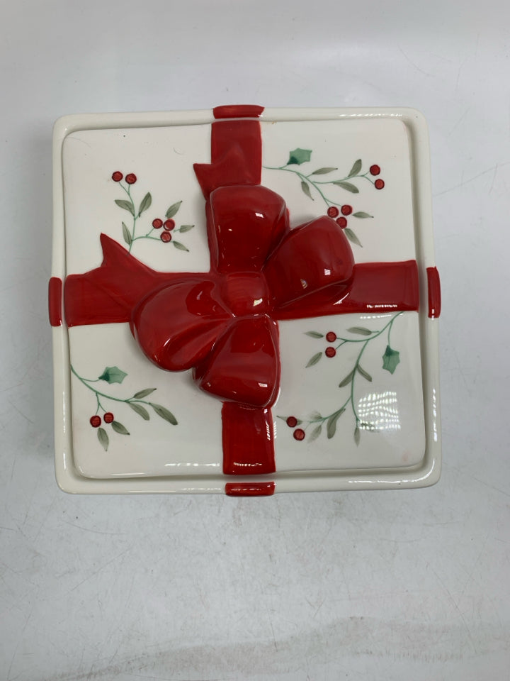 CERAMIC MISTLETOE PRESENT CANISTER W/ RED BOW.