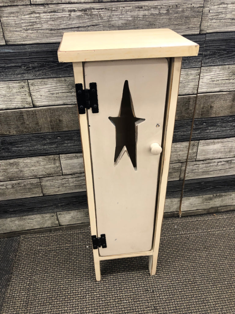 SMALL WHITE PRIMITIVE STAR CABINET.