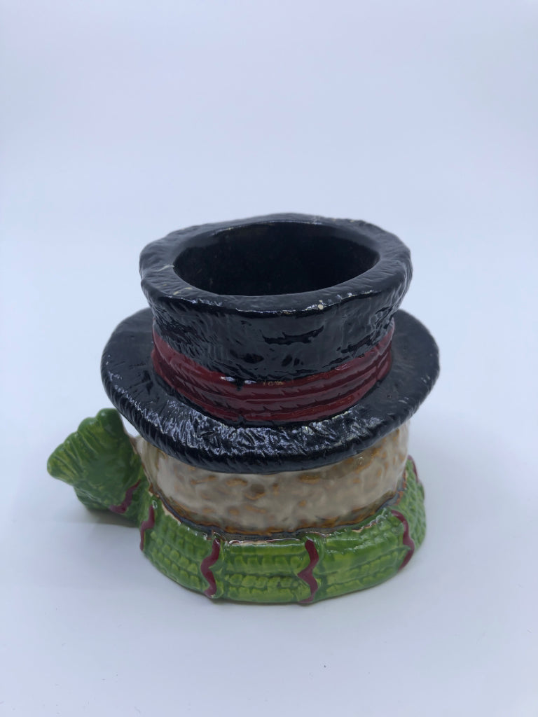 BROWN/WHITE SNOWMAN W GREEN SCARF CANDLE HOLDER.